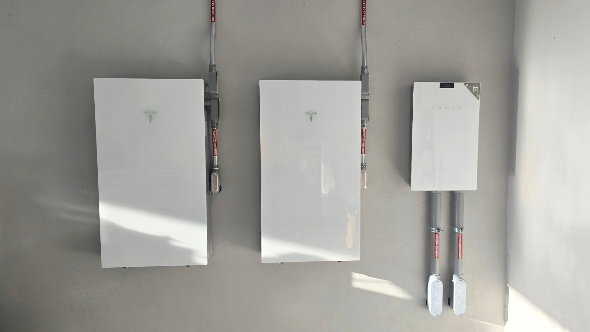 Residential solar panels and battery equipment installed at a Florida home